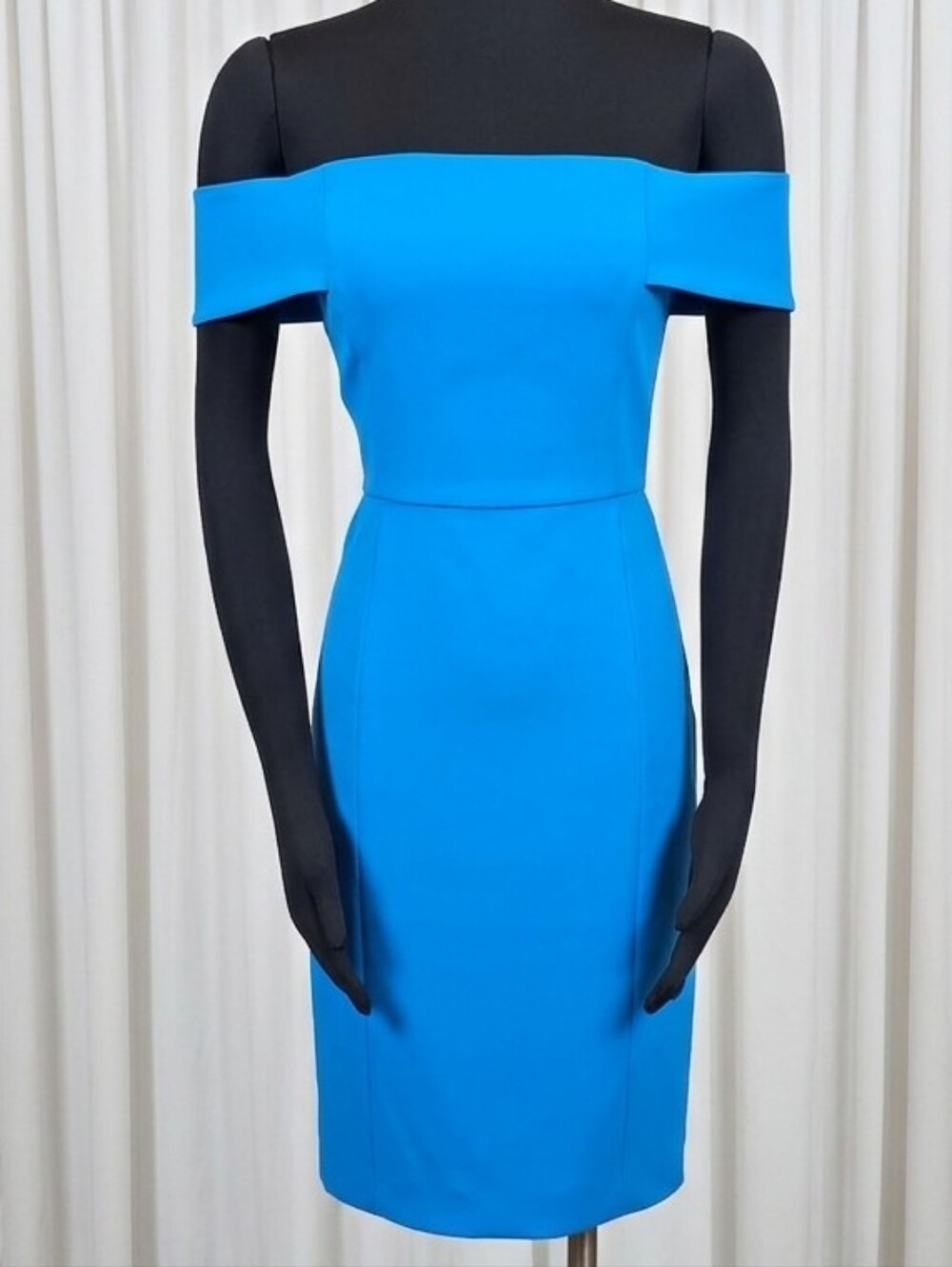 Rebecca Minkoff dress is the "Diana" mini sheath style in a vibrant blue.